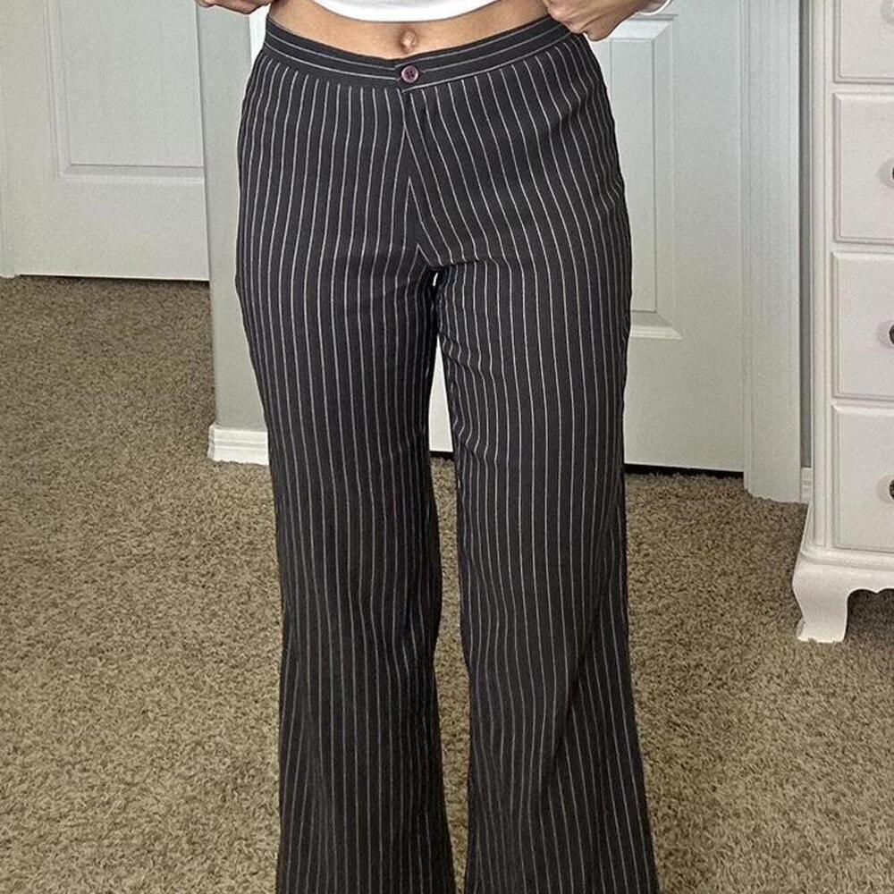 Grey and white pinstripe flare pants with a touch of retro style